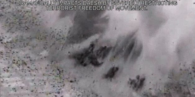 This image made from gun-camera video taken on July 4, 2015 and released by United States Central Command shows an airstrike on a bridge near Islamic State group-held Raqqa, Syria, that was a key transit route for the militants. After billions of dollars spent and more than 10,000 extremist fighters killed, the Islamic State group is fundamentally no weaker than it was when the U.S.-led bombing campaign began a year ago, American intelligence agencies have concluded. (U.S. Central Command via A