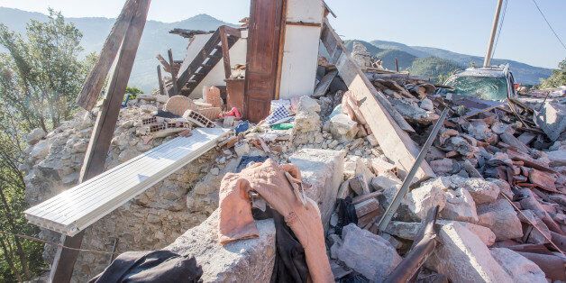 The survivors research continue in the destroyed building in the city of Pescara del Tronto, Italy on 25 August 2016 after the earthquake that shaked center Italy early in the morning on August 24, 2016 (Photo by Mauro Ujetto/NurPhoto via Getty Images)