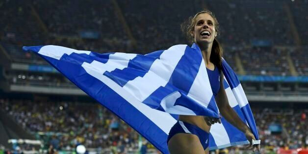 2016 Rio Olympics - Athletics - Final - Women's Pole Vault Final - Olympic Stadium - Rio de Janeiro, Brazil - 19/08/2016. Ekaterini Stefanidi (GRE) of Greece celebrates winning the gold medal. REUTERS/Dylan Martinez FOR EDITORIAL USE ONLY. NOT FOR SALE FOR MARKETING OR ADVERTISING CAMPAIGNS.