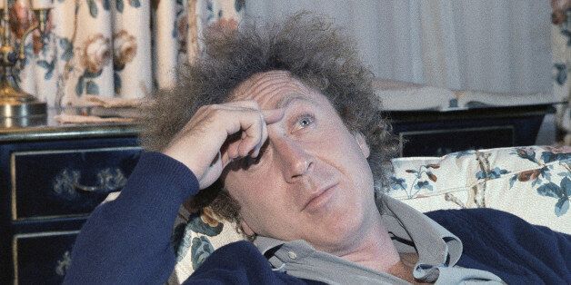 FILE - In a Dec. 9, 1977 file photo, actor Gene Wilder is shown during an interview with Jean Claude Bouis at his New York City Hotel. Wilderâs nephew said Monday, Aug. 29, 2016, that the actor and writer died late Sunday at his home in Stamford, Connecticut, from complications from Alzheimerâs disease. He was 83. (AP Photo/Richard Drew, File)
