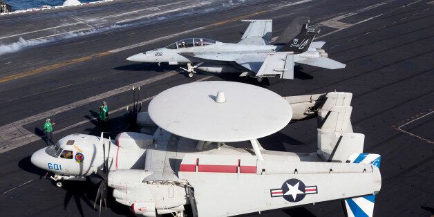 October 3, 2012 - An E-2C Hawkeye of VAW-121 Bluetails, during flight operations on the USS Dwight D. Eisenhower (CVN-69) in the Arabian Sea in support of Operation Enduring Freedom.