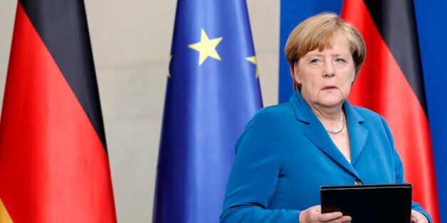 German Chancellor Angela Merkel arrives for a statement in Berlin, Germany, Saturday, July 23, 2016, on the Munich attack. Chancellor Angela Merkel says that the country's security services will 'do everything possible to protect the security and freedom of all people in Germany' in the wake of two attacks in less than a week. An 18-year-old German-Iranian man opened fire at a crowded shopping mall and a McDonald's in Munich on Friday, July 22, killing multiple people before killing himself. (AP Photo/Michael Sohn)
