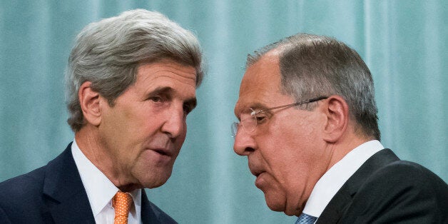 U.S. Secretary of State John Kerry, left, and Russian Foreign Minister Sergey Lavrov shake hands after their news conference following their long talks in Moscow, Russia, Friday, July 15, 2016. Lavrov and other Russian officials have called on their countrymen in Turkey to stay indoors amid uncertainty about whether a military coup is taking place. Lavrov made the statement early Saturday at a news conference with U.S. Secretary of State John Kerry. (AP Photo/Alexander Zemlianichenko)