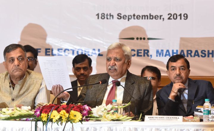 Chief Election Commissioner Sunil Arora (C) with election commissioner Ashok Lavasa (L) and Sushil Chandra (R) interacts with media during a press conference, on September 18, 2019 in Mumbai