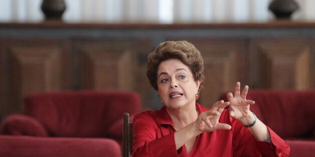 Brazil's suspended President Dilma Rousseff speaks on the process of impeachment during a press conference for foreign correspondents, at the official residence Alvorada Palace, in Brasilia, Brazil, Thursday, Aug. 18, 2016. Rousseff made a last-ditch effort Tuesday to avoid impeachment, telling Brazilian lawmakers she would let voters decide if they want an early presidential election if she is restored to power. (AP Photo/Eraldo Peres)