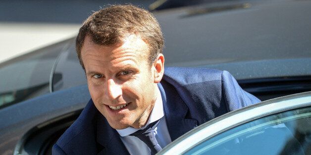 French Economy and Industry minister Emmanuel Macron arrives to visit the Rauschmaier insulation workshop on August 25, 2016 as part of his visit in Colmar. / AFP / SEBASTIEN BOZON (Photo credit should read SEBASTIEN BOZON/AFP/Getty Images)