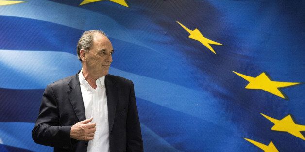 George Stathakis, Greece's economy minister, prepares to leave following a news conference in Athens, Greece, on Tuesday, April 12, 2016. Greece will take a one-week break in bailout review discussions with its creditors, after failing to reach an initial agreement, as officials from the Greek government, the euro area and the International Monetary Fund fly to Washington to attend IMF meetings. Photographer: Yorgos Karahalis/Bloomberg via Getty Images