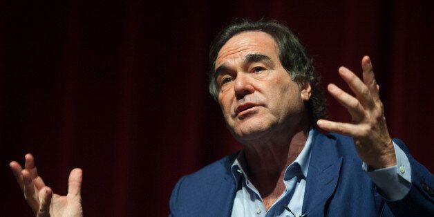 U.S. film director and screenwriter Oliver Stone speaks during a discussion with students at the University of Puerto Rico in San Juan November 30, 2012. REUTERS/Ana Martinez (PUERTO RICO - Tags: ENTERTAINMENT)