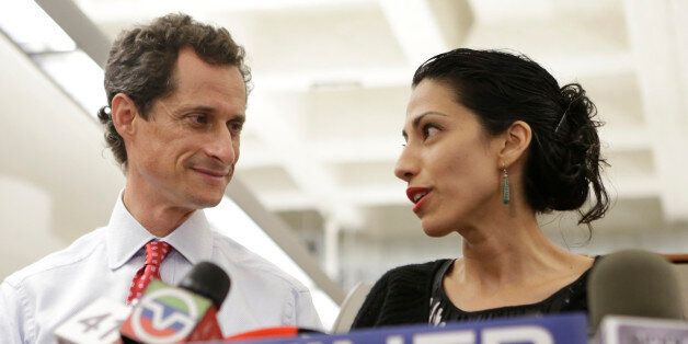 FILE - In this July 23, 2013 file photo, Huma Abedin, alongside her husband, then-New York mayoral candidate Anthony Weiner, speaks during a news conference in New York. Democratic presidential candidate Hillary Clinton aide Huma Abedin says she is separating from husband Anthony Weiner after another sexting revelation involving the former congressman from New York. (AP Photo/Kathy Willens, File)