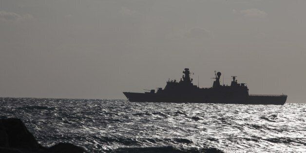 A picture taken on February 3, 2014, shows the Danish navy warship HDMS Esbern Snare outside the southern Cypriot coastal town of Larnaca. Danish and Norwegian vessels left the Cypriot port of Limassol Friday and headed towards Syria to escort a delayed shipment of chemical weapons for destruction, a spokesman said. AFP PHOTO/YIANNIS KOURTOGLOU (Photo credit should read Yiannis Kourtoglou/AFP/Getty Images)