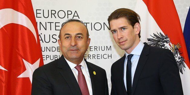 VIENNA, AUSTRIA - MAY 17: Turkish Foreign Minister Mevlut Cavusoglu (L) and Austrian Foreign Minister Sebastian Kurz (R) shake hands before their meeting in Vienna, Austria on May 17, 2016. (Photo by Fatih Aktas/Anadolu Agency/Getty Images)