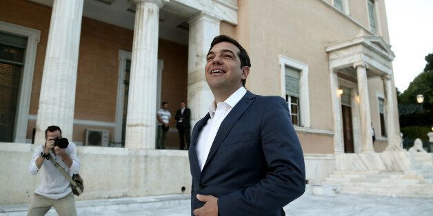 Greek Prime Minister Alexis Tsipras arrives at Parliament to present the main points of the government's proposal for the constitutional reform, in Athens on Monday, July 25, 2016 Tsipras said the constitution should be revised to give Greeks 'direct democracy'. (Photo by Panayiotis Tzamaros/NurPhoto via Getty Images)