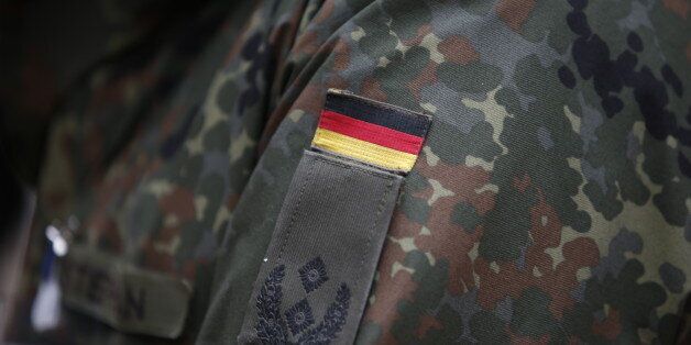 German Bundeswehr army soldiers demonstrate their skills at Kaserne Hochstaufen (mountain infantry military barracks) in Bad Reichenhall, southern Germany, March 23, 2016. REUTERS/Michaela Rehle