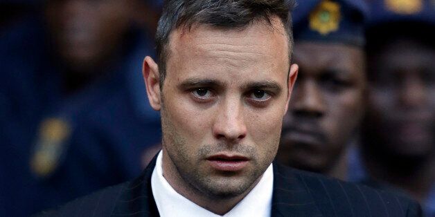 Oscar Pistorius leaves the High Court in Pretoria, South Africa, Wednesday, June 15, 2016, after his sentencing proceedings. An appeals court found Pistorius guilty of murder, and not culpable homicide for the shooting death of his girlfriend Reeva Steenkamp. (AP Photo/Themba Hadebe)