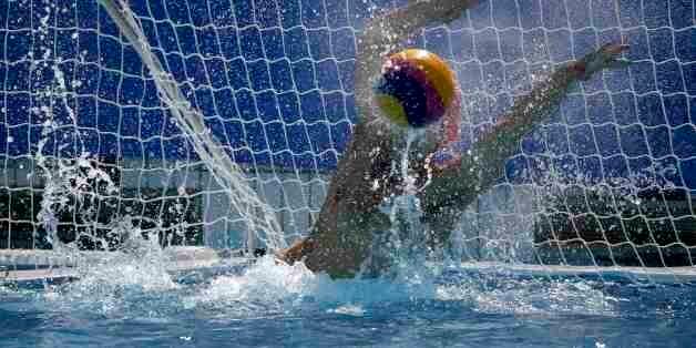 2016 Rio Olympics - Water Polo - Preliminary - Men's Preliminary Round - Group A Greece v Japan - Maria Lenk Aquatics Centre - Rio de Janeiro, Brazil - 06/08/2016. Goalkeeper Konstantinos Flegkas (GRE) of Greece makes a save. REUTERS/Laszlo Balogh TPX IMAGES OF THE DAY FOR EDITORIAL USE ONLY. NOT FOR SALE FOR MARKETING OR ADVERTISING CAMPAIGNS.
