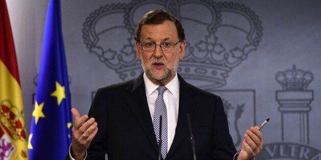 Spanish caretaker prime minister, Mariano Rajoy speaks during a press conference, following his meeting with Spain's king, at La Moncloa palace in Madrid on July 28, 2016. Spain's king tasked Mariano Rajoy today with the delicate task of forming a government and unblocking seven months of political paralysis after a second round of inconclusive elections, the acting prime minister announced. / AFP / GERARD JULIEN (Photo credit should read GERARD JULIEN/AFP/Getty Images)