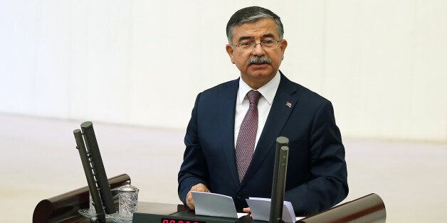 Ismet Yilmaz, the ruling Justice and Development Party's candidate and the Defense Minister in the outgoing government, addresses the Parliament after his election as the new Speaker in Ankara, Turkey, Wednesday, July 1, 2015. (AP Photo)