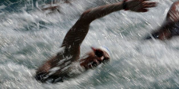 Greece's Spiros Gianniotis competes during the men's marathon swimming competition of the 2016 Summer Olympics in Rio de Janeiro, Brazil, Tuesday, Aug. 16, 2016. (AP Photo/Gregory Bull)