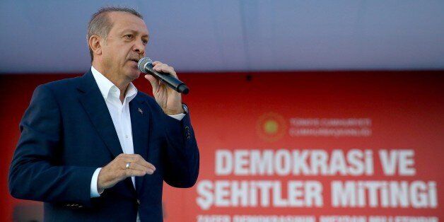 Turkish President Recep Tayyip Erdogan delivers a speech during a Democracy and Martyrs' Rally in Istanbul, Sunday, Aug. 7, 2016. More than 1 million flag-waving Turks gathered in Istanbul on Sunday for an anti-coup rally to mark the end of nightly demonstrations since the July 15 abortive military insurrection that left more than 270 people dead (Kayhan Ozer/Presidential Press Service via AP)