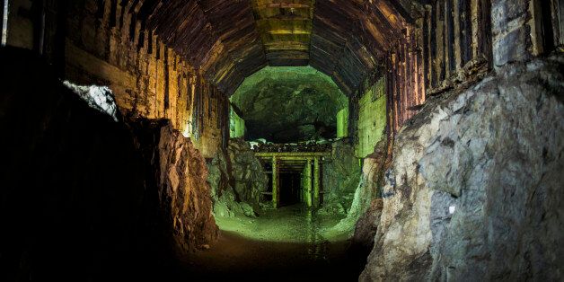 WALBRZYCH, POLAND OCTOBER 20: (SOUTH AFRICA AND POLAND OUT) A tunnel that is part of Nazi underground complex on October 20, 2015 In Walbrzych, Poland. The mysterious underground Nazi city Riese where it is alleged the legendary Nazi Gold Train is hidden. In September 2015 the Polish Army started to examine the neighborhood where it is alleged that two treasure hunters hid a Nazi train filled with guns and jewels. Polish authorities are almost certain they located the train between 61km to 67km on the railway track between Wroclaw to Walbrzych. Local legend says the train mysteriously went missing in January 1945, moments before the end of World War Two. (Photo by Adam Guz/Getty Images Poland/Getty Images)