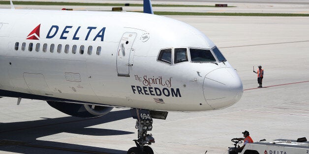 FORT LAUDERDALE, FL - JULY 14: A Delta airlines plane is seen on the tarmac of the Fort Lauderdale-Hollywood International Airport on July 14, 2016 in Fort Lauderdale, Florida. Delta Air Lines Inc. reported that their second quarter earnings rose a better-than-expected 4.1%, and also announced that they decided to reduce its United States to Britian capacity on its winter schedule because of foreign currency issues and the economic uncertainty from Brexit. (Photo by Joe Raedle/Getty Images)