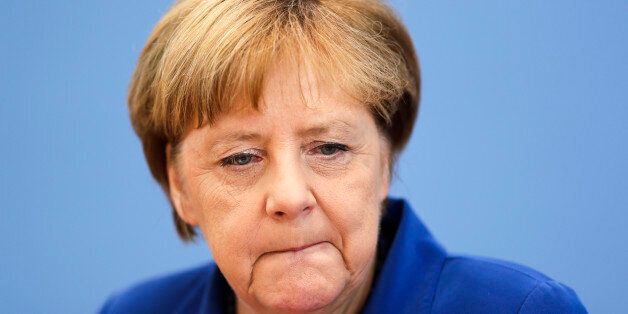 German Chancellor Angela Merkel attends a news conference in Berlin Thursday, July 28, 2016 . Chancellor Angela Merkel says the fact that two men who came to Germany as refugees carried out attacks claimed by the Islamic State group