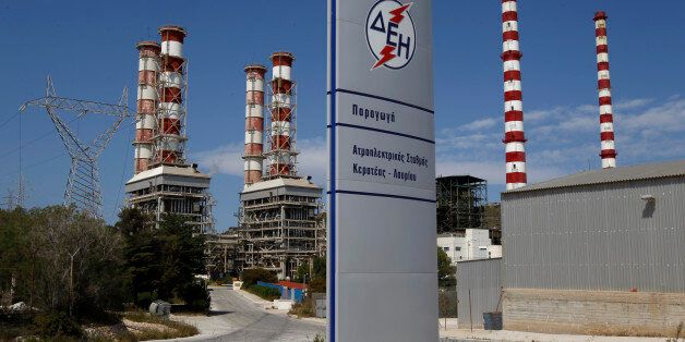 A general view of Public Power Corporation's (PPC) natural gas-fired power station at Lavrio town southeast of Athens May 13, 2011. Greece's cash-strapped government, which owns 51 percent of PPC, plans to sell as much as 17 percent in the company next year as part of its 50 billion euro privatisation drive to pay down debt and avoid bankruptcy. PPC's labour union GENOP opposes the move and threatens rolling 48-hour strikes to prevent it. REUTERS/Yiorgos Karahalis (GREECE - Tags: BUSINESS ENERGY POLITICS)