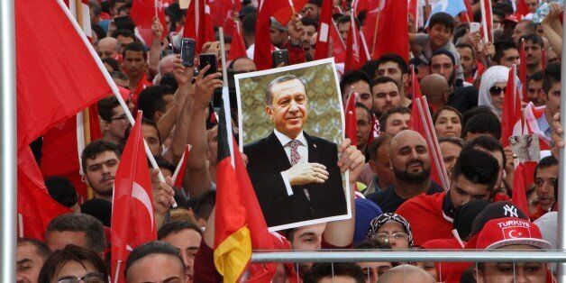 COLOGNE, GERMANY - JULY 31 : Thousands of Turkish people living in Europe attend pro-democracy rally in Cologne, Germany on July 31, 2016 to protest July 15 failed coup attempt in Turkey. (Photo by Mesut Zeyrek/Anadolu Agency/Getty Images)