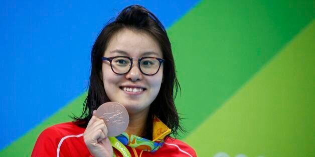 2016 Rio Olympics - Swimming - Women's 100m Backstroke Victory Ceremony - Olympic Aquatics Stadium - Rio de Janeiro, Brazil - 08/08/2016. Fu Yuanhui (CHN) of China (PRC) pose with her medal REUTERS/David Gray FOR EDITORIAL USE ONLY. NOT FOR SALE FOR MARKETING OR ADVERTISING CAMPAIGNS.