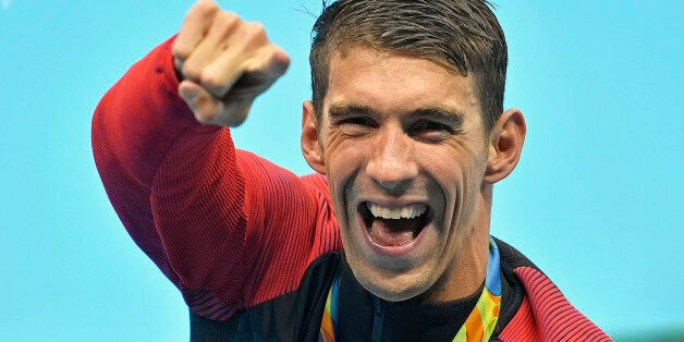 United States' Michael Phelps celebrates after winning the gold medal in the men's 4x100-meter final during the swimming competitions at the 2016 Summer Olympics, Monday, Aug. 8, 2016, in Rio de Janeiro, Brazil. (AP Photo/Martin Meissner)
