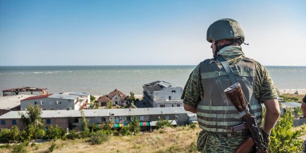 Soldier of the Donbass battalion goes to his surveillance post in the frontline of Shyrokyne, Ukraine. In background, the Azov sea. (Photo by Celestino Arce/NurPhoto) (Photo by NurPhoto/NurPhoto via Getty Images)