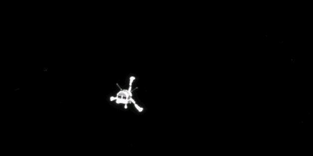 DARMSTADT, GERMANY - NOVEMBER 12: (EDITORIAL USE ONLY) In this November 12, 2014 handout photo provided by the European Space Agency (ESA) the Philae lander is pictured on its way to the 67P/Churyumov-Gerasimenko comet after a successful separation from the Rosetta probe. ESA later successfully landed Philae, making it the first man-made craft to ever land on a comet. The Philae lander, launched from the Rosetta probe, is a mini laboratory that will gather data on the comet. (Photo ESA via Getty Images)