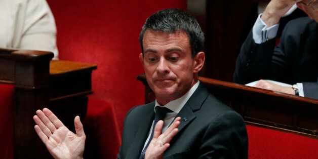 French Prime Minister Manuel Valls gestures during the questions to the government session at the National Assembly in Paris, France, July 20, 2016. REUTERS/Philippe Wojazer