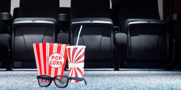 3D glasses, popcorn and soda in home theater