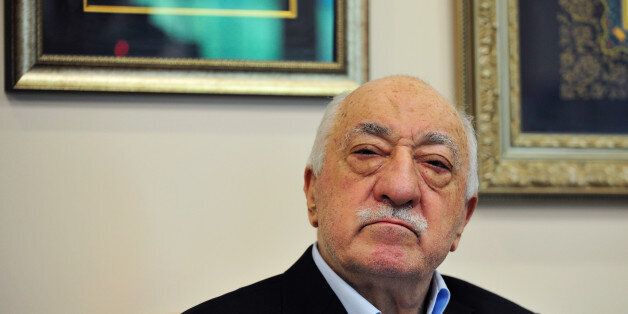 Islamic cleric Fethullah Gulen poses for a photo while speaking to members of the media at his compound, Sunday, July 17, 2016, in Saylorsburg, Pa. Turkish officials have blamed a failed coup attempt on Gulen, who denies the accusation. (AP Photo/Chris Post)