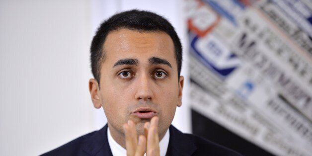 This photo taken on December 18, 2014 shows Five Star party member and Vice President of the Chamber of Deputies Luigi Di Maio speaking during a press conference in Rome. Italy's anti-establishment Five Star party, founded in 2009 by former comedian Beppe Grillo, is itching to govern and has a man primed for the top job. 'Today we are ready, much more than in 2013,' Luigi di Maio, one of Five Star's most prominent members, said during an interview. AFP PHOTO / ANDREAS SOLARO (Photo credit should read ANDREAS SOLARO/AFP/Getty Images)