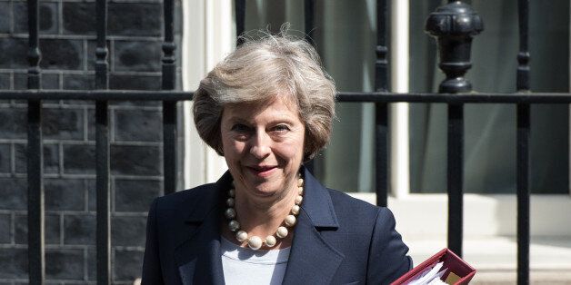 LONDON, ENGLAND - JULY 20: British Prime Minister Theresa May leaves number 10 Downing Street to attend Prime Minister's Questions at the Houses of Parliament on July 20, 2016 in London, England. This will be Theresa May's first PMQ's since becoming the British Prime Minister a week ago after David Cameron stepped down following the result of the EU referendum. (Photo by Chris J Ratcliffe/Getty Images)