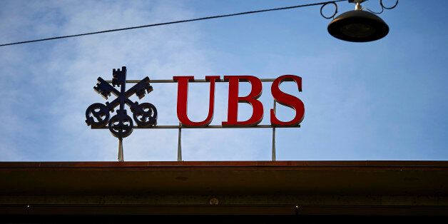 A photo taken on February 2, 2016 shows the logo of Swiss bank UBS on a building on Paradeplatz in Zurich.Swiss banking giant UBS on February 2 posted a 79-percent higher net profit for 2015, beating analyst expectations, with tax benefits offsetting a difficult fourth quarter hit by market turmoil. / AFP / Michael Buholzer (Photo credit should read MICHAEL BUHOLZER/AFP/Getty Images)