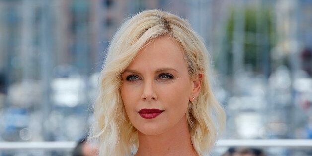 Cast member Charlize Theron poses during a photocall for the film