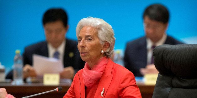 International Monetary Fund (IMF) director Christine Lagarde (C) speaks at the 1+6 Roundtable on promoting growth in the Chinese and global economies at the Diaoyutai State Guesthouse in Beijing, China, July 22, 2016. REUTERS/Mark Schiefelbein/Pool