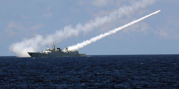 SANYA, July 9, 2016-- Missile destroyer Guangzhou launches an air-defense missile during a military exercise in the water area near south China's Hainan Island and Xisha islands, July 8, 2016. Chinese navy conducted an annual combat drill in the water area near south China's Hainan Island and Xisha islands on Friday. (Xinhua/Zha Chunming via Getty Images)