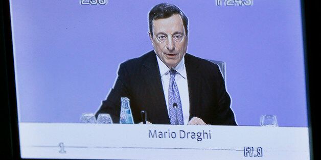 President of the European Central Bank Mario Draghi is seen speaking on a video screen during a press conference in Frankfurt, Germany, Thursday, July 21, 2016, after a meeting of the governing council. (AP Photo/Michael Probst)