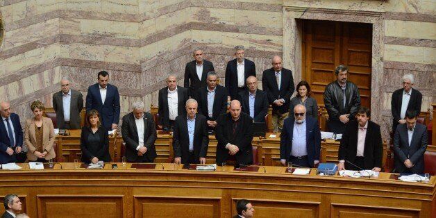 ATHENS, GREECE - 2016/02/20: Members of the Greek parliament keep a minute of silence in the memory of the refugees that died trying to enter Greece. Greek Legislators voted in the Greek parliament for the Greek Government's 'Parallel program', a packet measured to assist the people in need all over Greece in healthcare, education and benefits. (Photo by George Panagakis/Pacific Press/LightRocket via Getty Images)