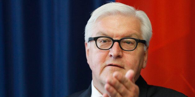 Germany's Foreign Minister Frank-Walter Steinmeier answers questions during a press conference after a meeting with Lithuania's Foreign Minister Linas Linkevicius in Vilnius, Lithuania, Thursday May 26, 2016. (AP Photo/Mindaugas Kulbis)