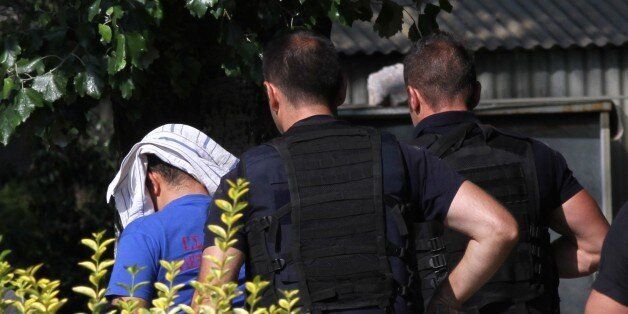 ATHENS, GREECE - JULY 27 : Turkish military officers are taken to police station after their interview on asylum requests postponed for a month in Athens, Greece on July 27, 2016. Eight Turkish military officers who fled to Greece by a military helicopter following the last week's failed coup attempt in Turkey. (Photo by Ayhan Mehmet/Anadolu Agency/Getty Images)