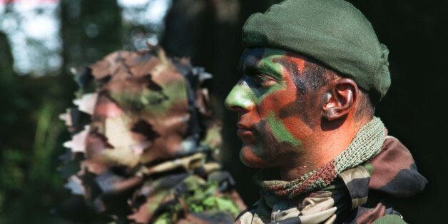 French Army Special Forces soldiers wears camouflage make-up during a presentation to officials at Canjuers military camp , September 15.