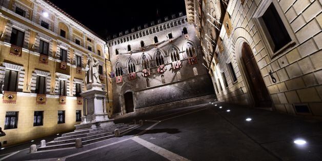 This picture shows the headquarters of the Monte dei Paschi di Siena bank on July 1, 2016 in Siena, in the Italian region of Tuscany.Italy's number-three bank, Banca Monte dei Paschi di Siena, took a hammering on the stock market on July 4 as the European Central Bank told it to slash its large bad-debt burden. Investors, many of them shaken by Britain's vote to leave the European Union, are fretting over the fragile balance sheets of debt-laden Italian banks. Banca Monte dei Paschi di Siena, or BMPS, is among the banks at the forefront of those concerns with gross bad loans amounting to 46.9 billion euros ($52 billion). / AFP / GIUSEPPE CACACE (Photo credit should read GIUSEPPE CACACE/AFP/Getty Images)