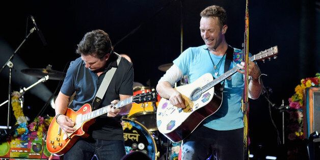 EAST RUTHERFORD, NJ - JULY 17: Actor Michael J. Fox (L) performs onstage with recording artist Chris Martin of Coldplay during the Coldplay 'A Head Full of Dreams' Tour at MetLife Stadium on July 17, 2016 in East Rutherford, New Jersey. (Photo by Kevin Mazur/Getty Images for Atlantic Records)