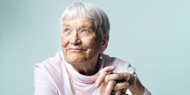 Mature woman thinking of all the good she has done and seen in life.