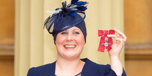 LONDON, ENGLAND - JUNE 12: Kate Granger holds her MBE which was awarded to her by the Prince of Wales at an investiture ceremony at Buckingham Palace on June 12 , 2015 in London, England. (Photo by Dominic Lipinski/WPA Pool/Getty Images)